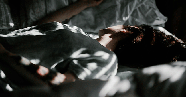 person sleeping in bed