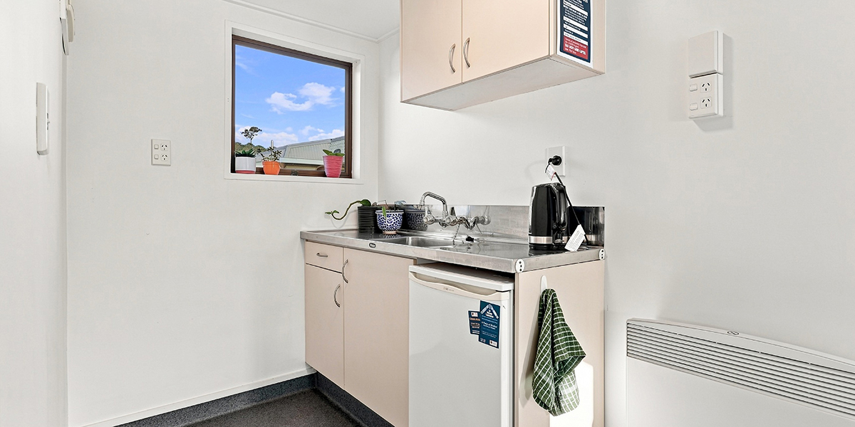Kitchenette area with fridge 