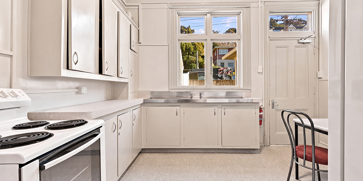 Shared kitchen with table and chairs