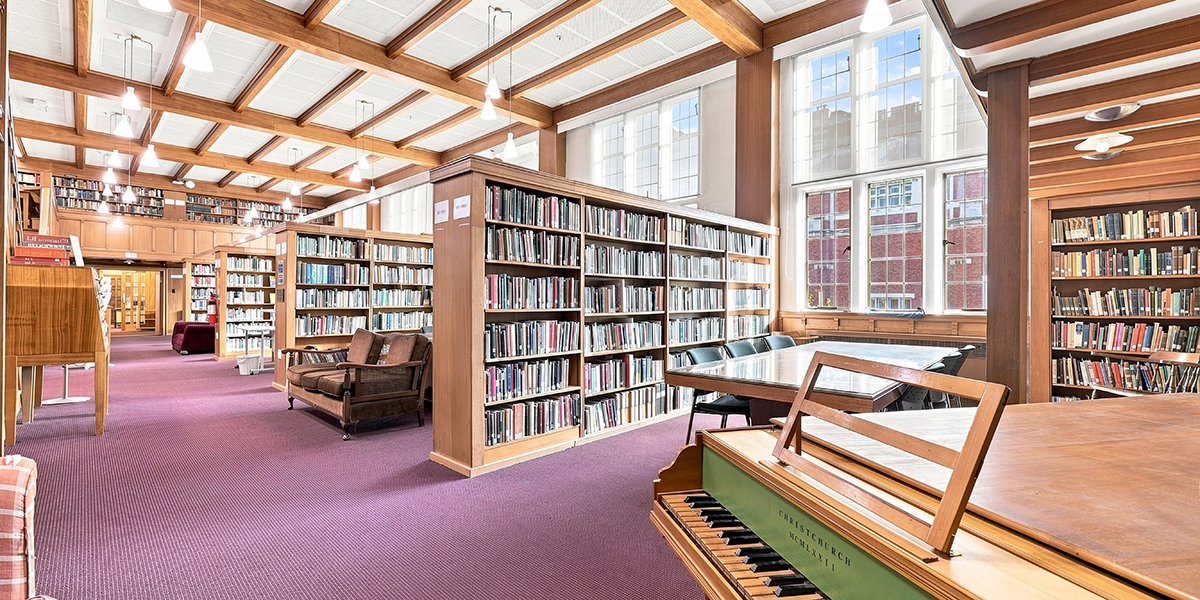 Library with a piano in the foreground