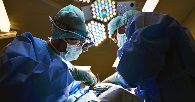 two surgeons operating 