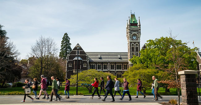 A generic image of people walking through campus.