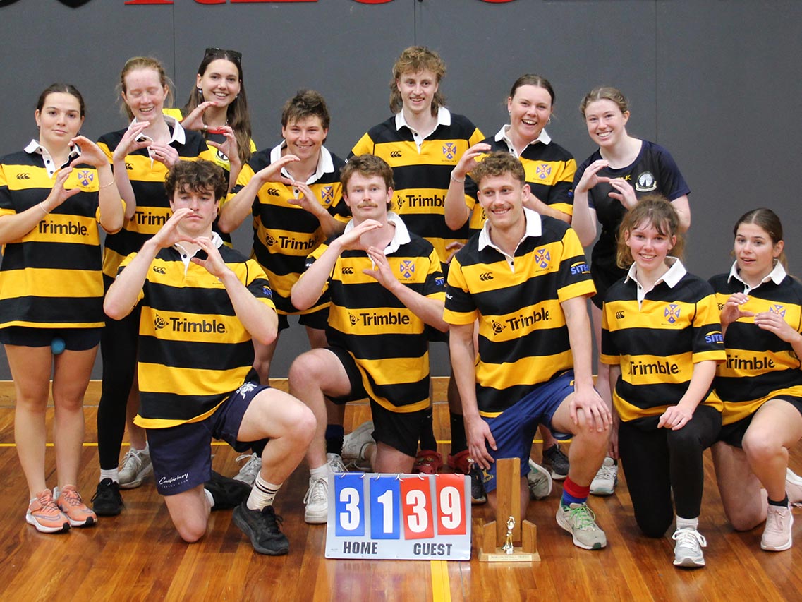 Brayden Foote, centre, participated in the Trimble supported 2025 Marlowe Cup competition event held in Christchurch this year that saw the Otago Surveying Student Association netball team take out the title.  