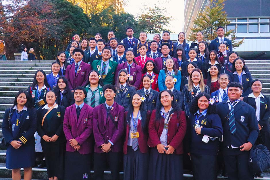 A large group of Pacific Island students in school uniforms on the University of Otago Leith steps