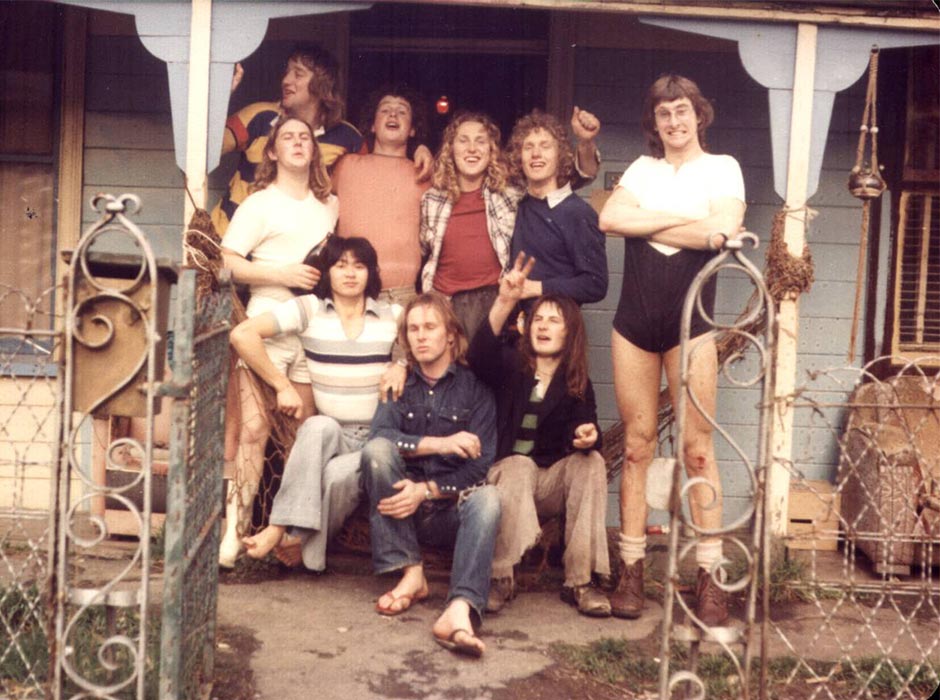 A group of students pose outside their Castle St flat in the 1970s.
