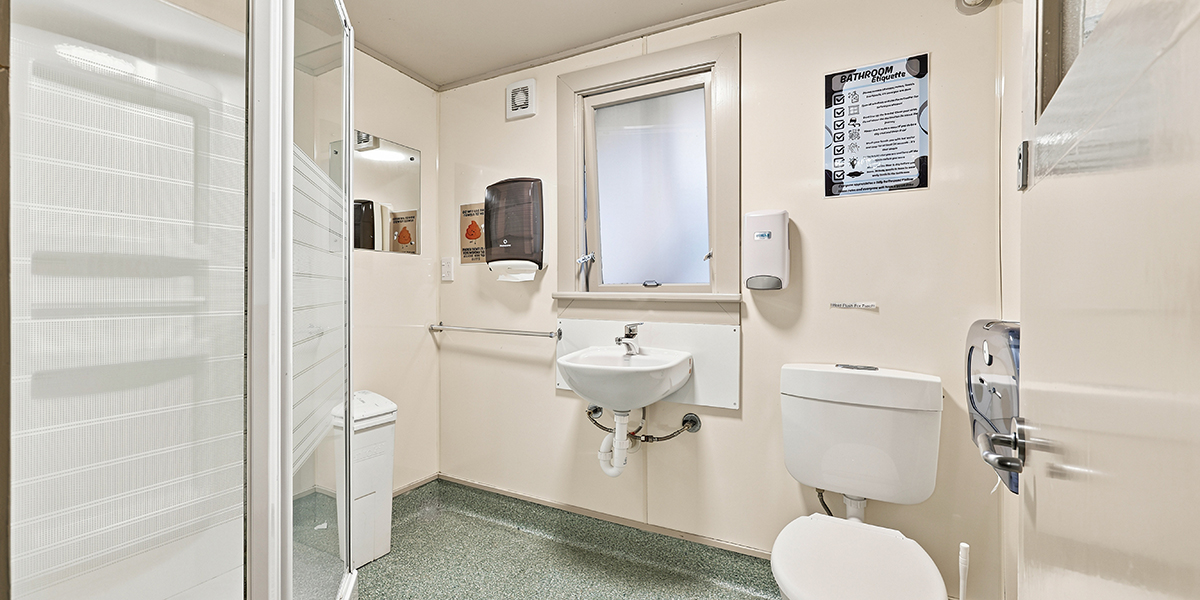Bathroom with shower, sink and toilet
