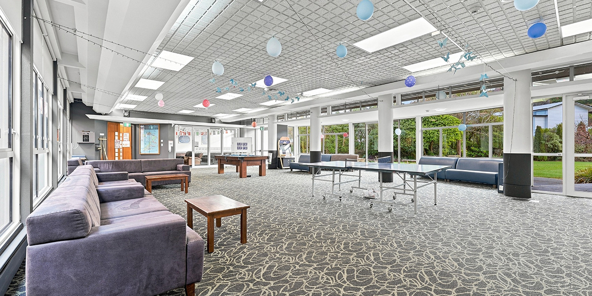 Common area with sofas, table tennis table and pool table