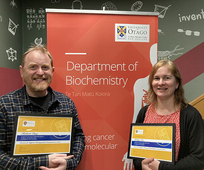Robyn Lee and Rob Day with BMS award certificates