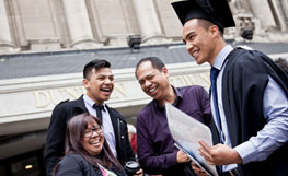 University of Otago graduates celebrating on the Dunedin campus. Image.