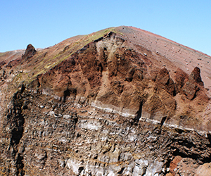 The colourful volcanic rocks and soils in the crater of Mt Vesuvius, Italy.