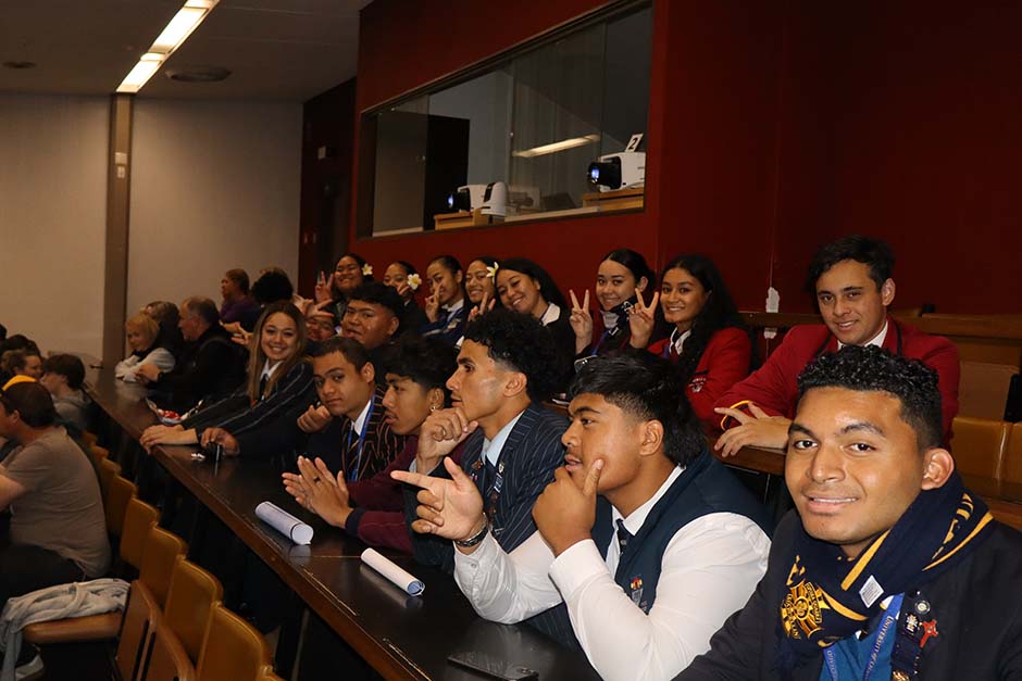 A large group of Pacific Island students in school uniforms sitting in a University of Otago lecture theatre