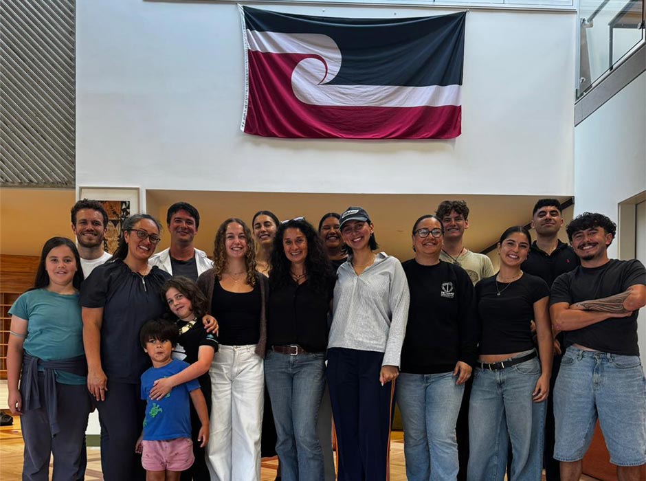 A group of staff, students and family members pose for a photo at Te Tumu.