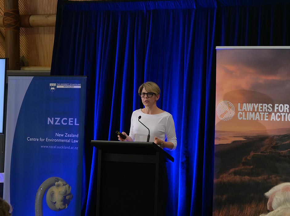 Jenny Cooper KC presenting at a conference.