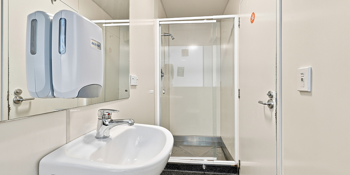 Bathroom with shower and sink