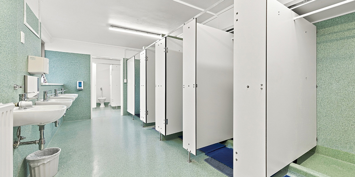 Shared shower facilities with sinks and shower cubicles