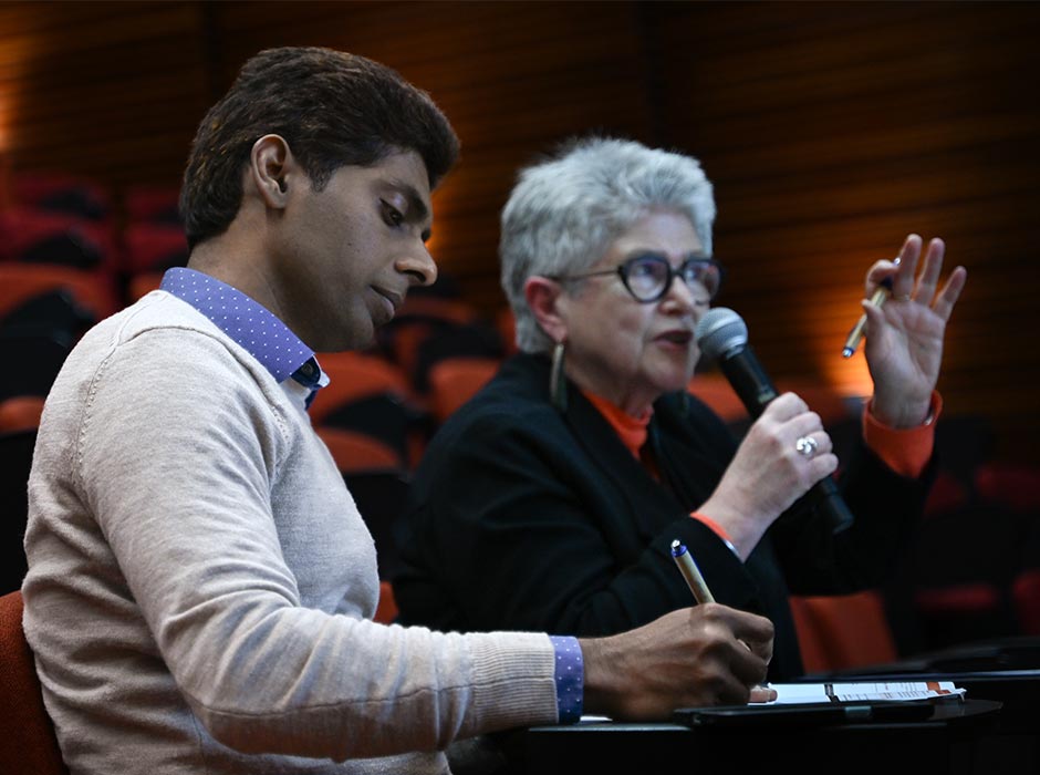 Dr Hemakumar Devan and Emerita Professor Dawn Elder share their feedback during the Wellington Three Minute Thesis (3MT) Heat. 