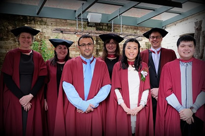 Pharmacy PhD graduates with staff