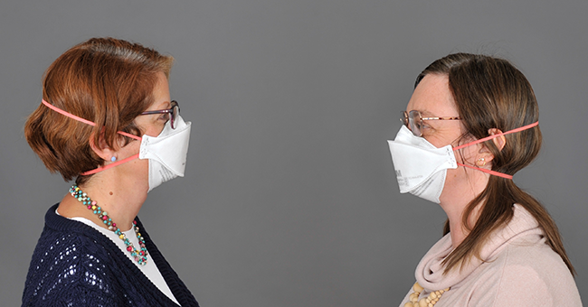 University of Otago staff wear respirator (N95) masks. 