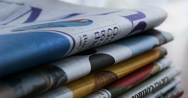 A generic image of a stack of newspapers
