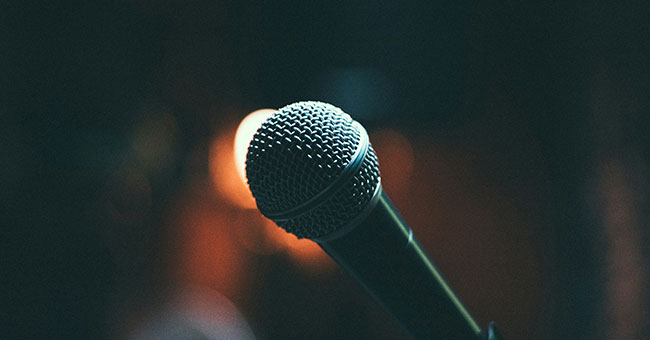 Close up of microphone with blurred background