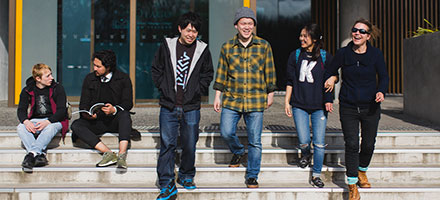 Students on front steps of Pathway building