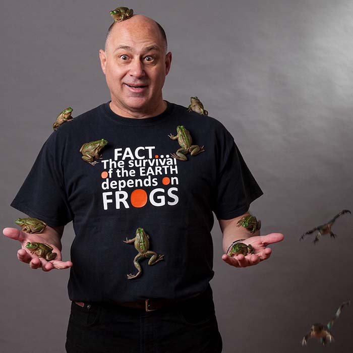 Professor Phil Bishop holding frogs