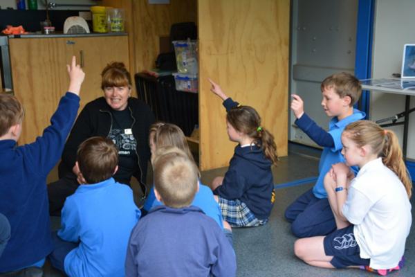 Dr Judith Bateup and a class from Catlins Area School talk about the wonders of microbial world during a visit to Lab in a Box
