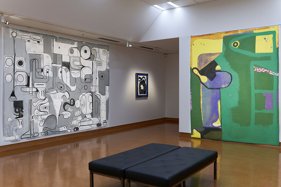 Large room with 3 highly abstract paintings, two taking up whole walls and one about A2 size.