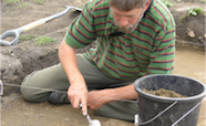 Chris Jacomb excavating an adze thumb