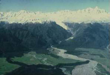 View across the coastal plain to the Alpine Fault and Southern Alps at Franz Josef