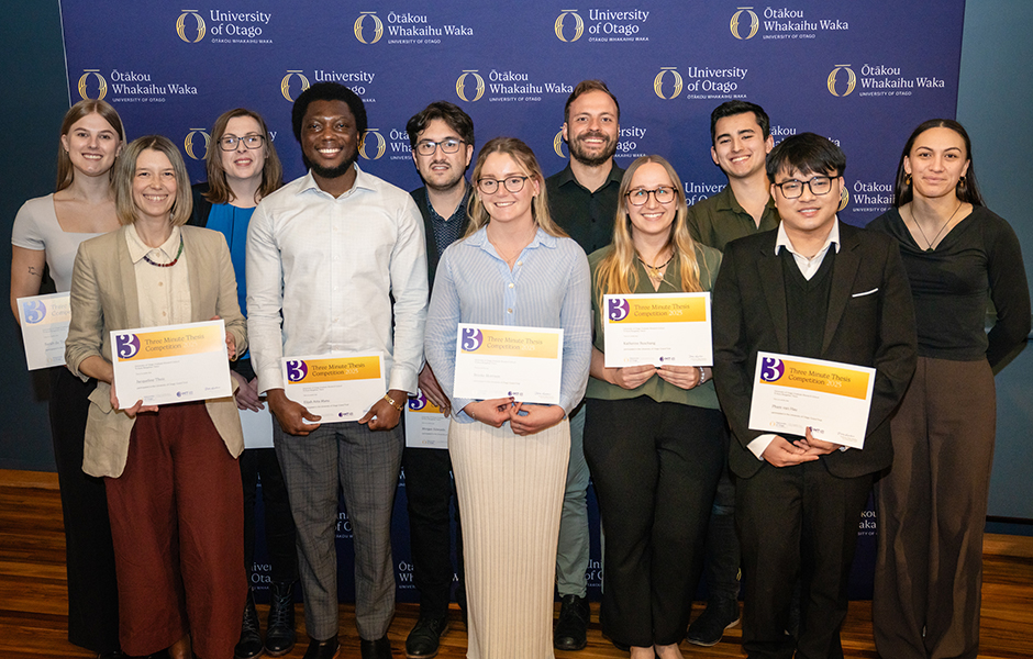 Group of 3MT grand final 2025 winners standing together holding certificates.