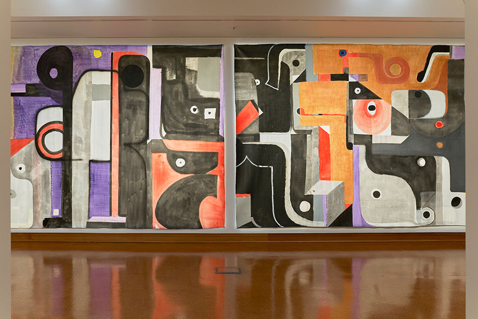 Two large and similar themed abstract paintings side by side in a large room.