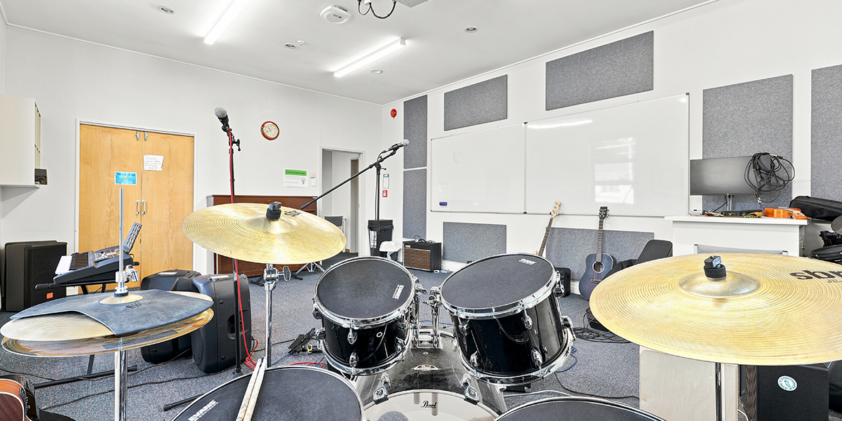 Music room with drum kit and other music equipment