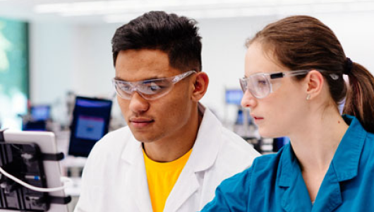 two students in a lab