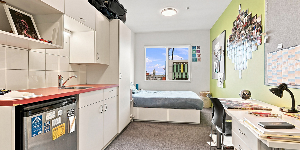 Student bedroom with kitchenette and desk