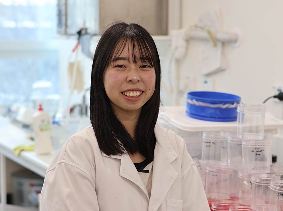  Food Science master's student Nazuna Harada in the 'nursery' where she grows the prize-winning larvae that could help devour food waste.  
