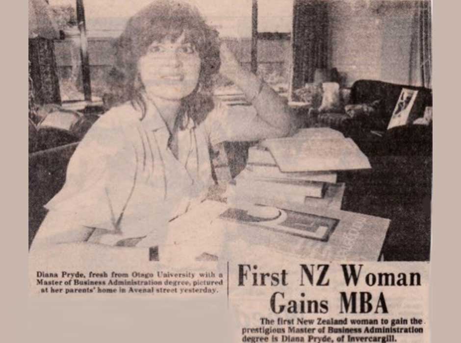 A scanned black and white newspaper clipping of a woman shown from waist up wearing a shirt