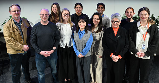 Contestants and judges are pictured with Coordinator Student Experience Trevor Williams (far left), who organised the Wellington Heat of the Three Minute Thesis (3MT) competition held in the Nordmeyer Theatre on 29 July. 