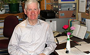 ANews1121 Assoc Prof John Clark in his office 2010 thumbnail