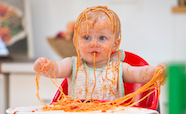 Baby eating pasta tn