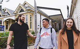 Three Māori students by Māori Centre