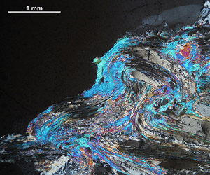 Folding of kyanite and bright blue muscovite within a quartz vein. Onekaka Schist, Northwest Nelson. 