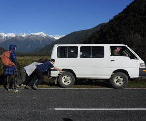 Yet another break down of one of the geology department vans, during the Whataroa geophysics field school. Southern Alps in the background