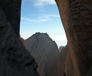 Tushuk Tash, near Kashgar, in western China is a natural arch made of conglomerate. From the floor of the canyon, its height is about 400m