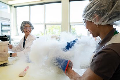 Students using dry ice in lab at Hands On