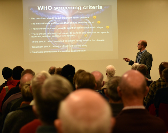 Michael Vincent presenting on prostate cancer at a public lecture image