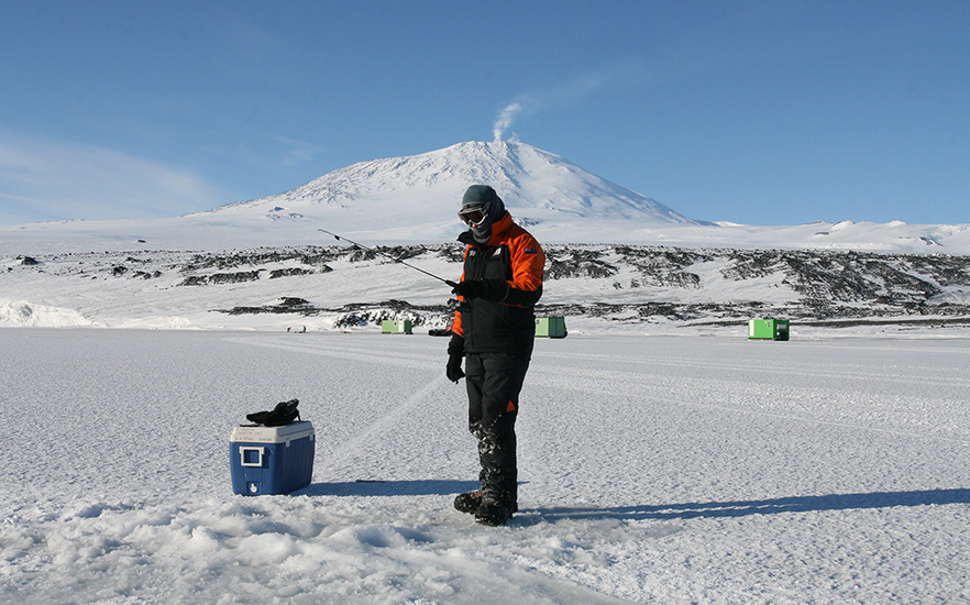 Male Univerisity Staff member fishing in the Antarctic image 1x