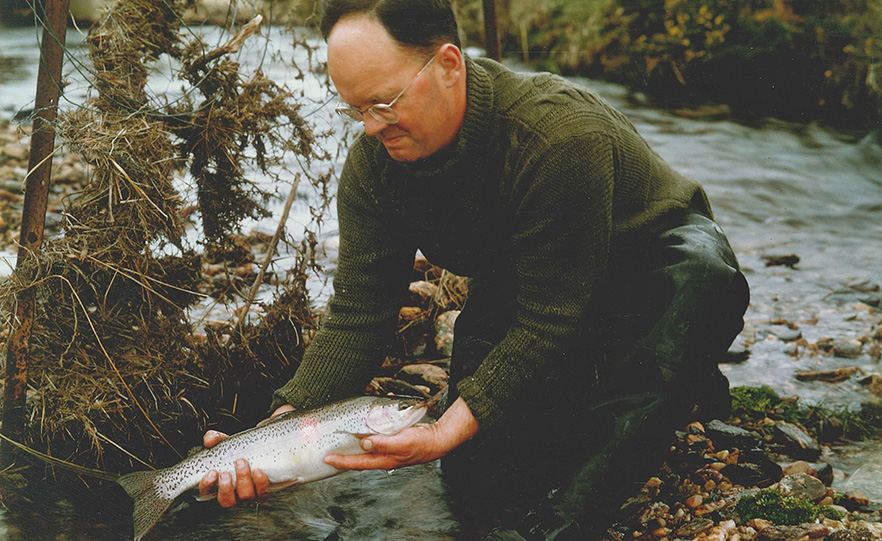 Donald Scott holding a rainbow trout at Post Office Creek in 1971 image
