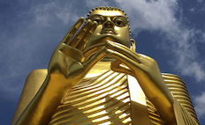 Buddha statue against the sky in Sri Lanka