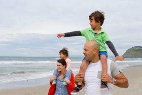 Family on a beach image 